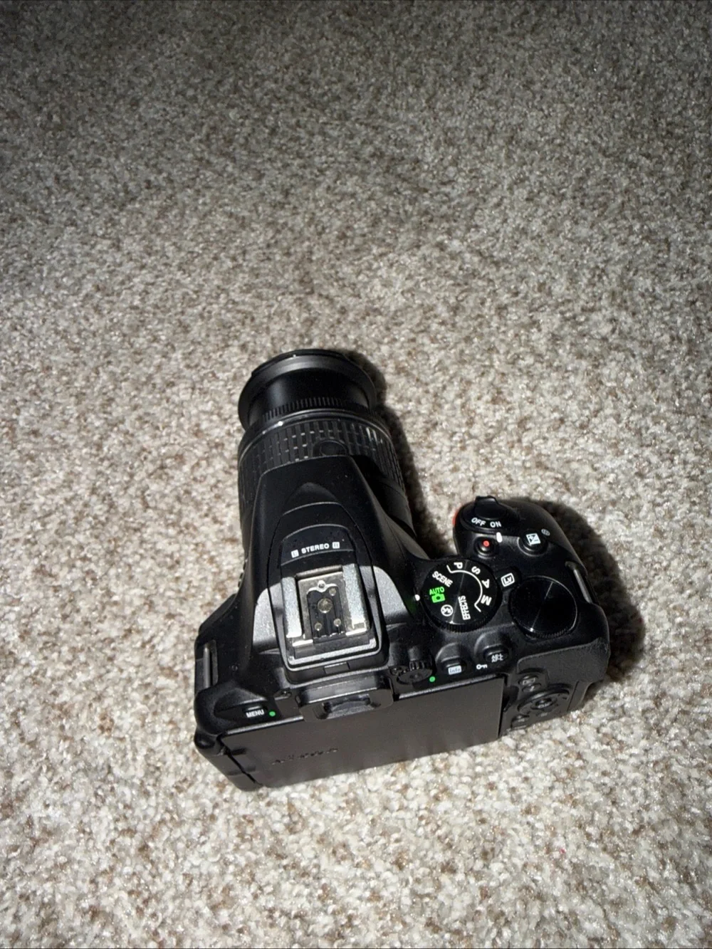 Nikon Black D5600 camera with lens and battery, battery charger